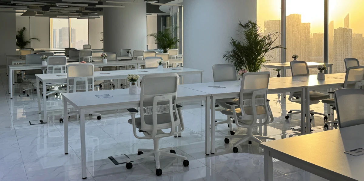 Open coworking desks at MY Coworking in ADGM with city views